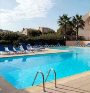 Cap d'Agde méditerranée studio 4 pers piscine rdc parking gratuit